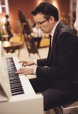 Am Klavier